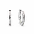 Hand holding two diamond rings with a dark background
