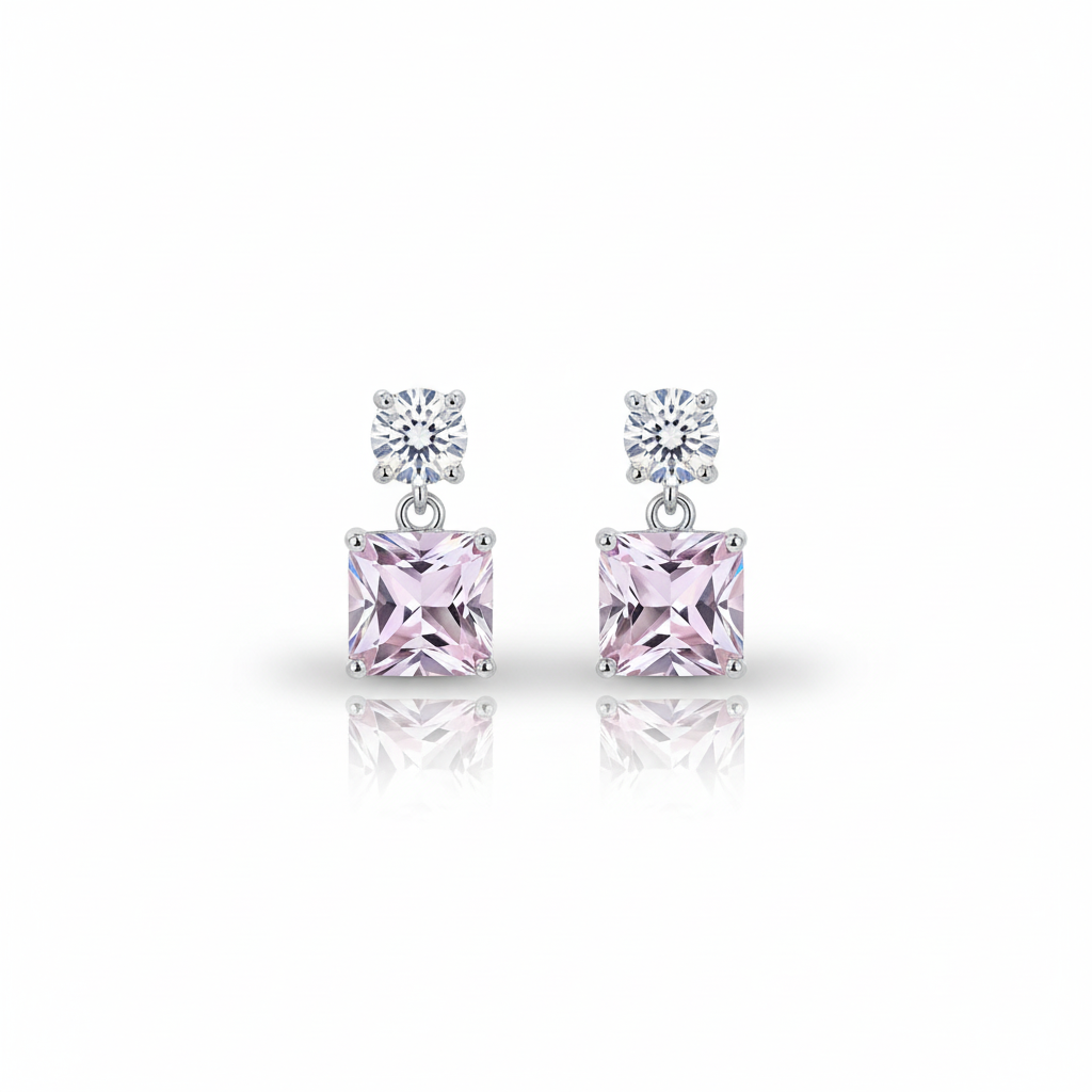 Pair of pink gemstone earrings on a white background