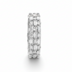 Silver ring with embedded diamonds on a white background