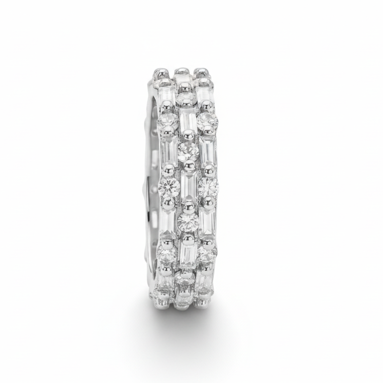 Silver ring with embedded diamonds on a white background