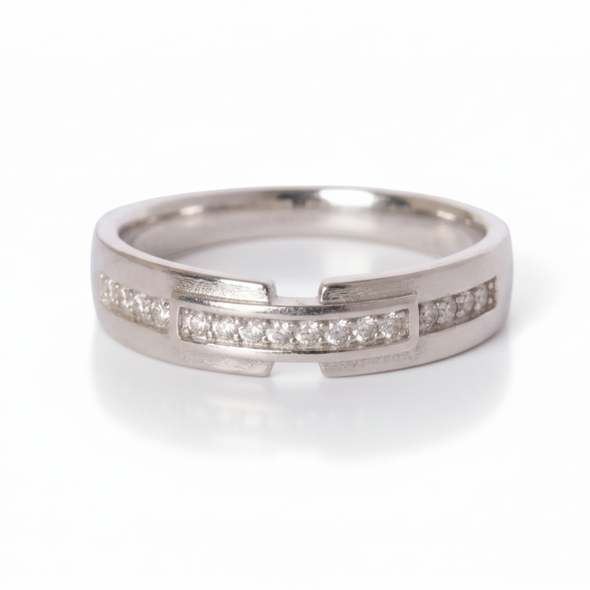 Silver ring with small diamonds on a white background