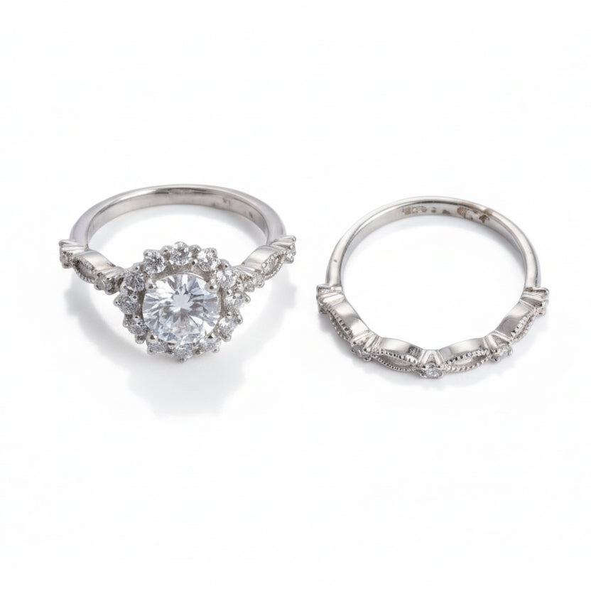 Two silver rings on a light gray background