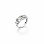 Diamond ring with baguette and round cut stones on a white background