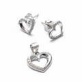Silver heart-shaped earrings and pendant on a white background