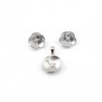 Silver jewelry set with pendant and earrings on a white background