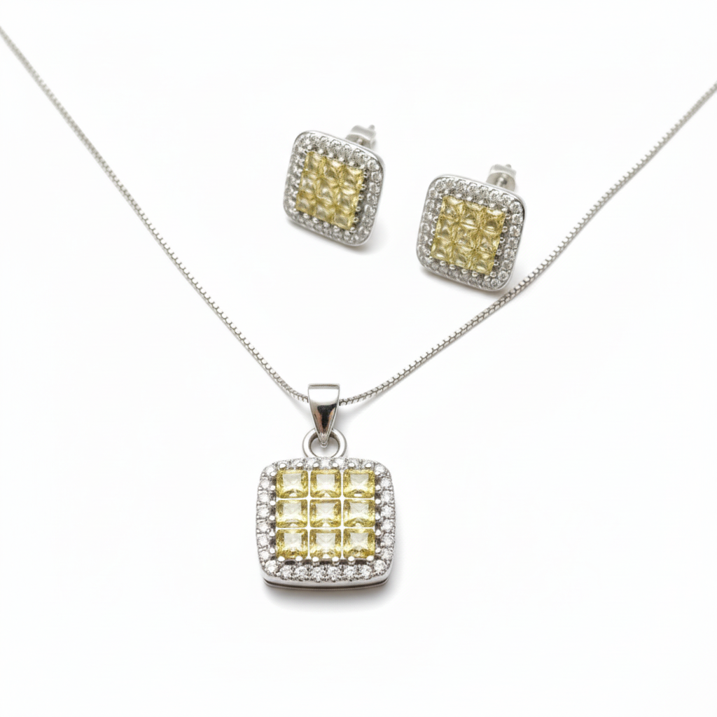 Jewelry set with square pendant and matching earrings on a white background