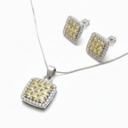 Jewelry set with square pendant and matching earrings on a white background