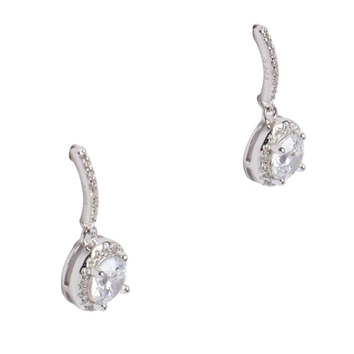Pair of silver earrings with clear gemstones on a white background