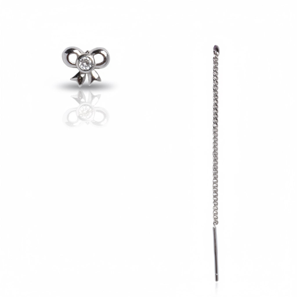 Silver bow-shaped earring with a chain on a white background