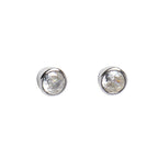 Pair of silver stud earrings with clear gemstones on a white background