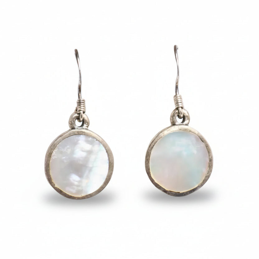 Pair of earrings with round, light-colored gemstones on a white background