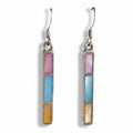 Pair of earrings with colorful rectangular stones on a white background