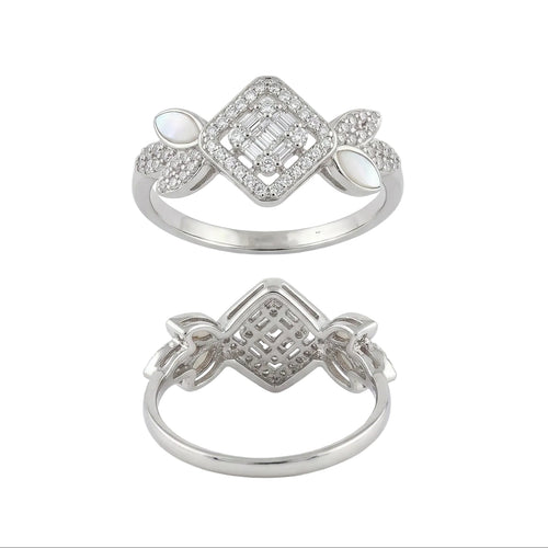 Two silver rings with intricate designs on a white background
