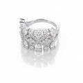 Silver ring with gemstones on a light gray background