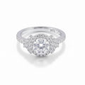 Silver ring with a diamond on a white background