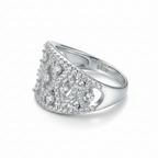 Silver ring with diamond accents on a white background
